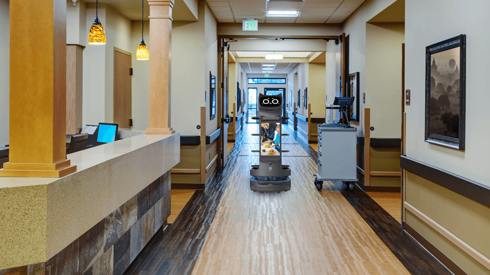 BellaBot Pro autonomously navigating a hotel corridor